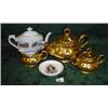 Image 1 : Continental gilt teapot matching sugar and jug plus another commemorative teapot and plate