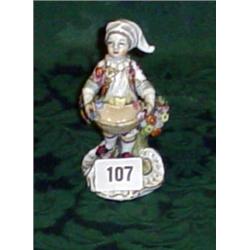Continental Sampson figure marked AR (Augustus Rex) boy with basket 4.5" high