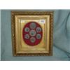 Image 1 : Framed and glazed display of antique Roman coins