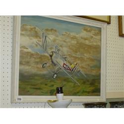 Framed oil-on-board of a biplane