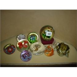 Nine various paper weights together with pottery frog