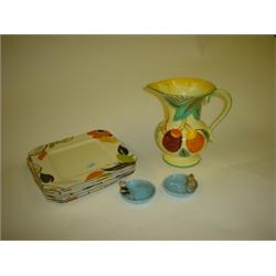 Five rectangular Myott plates, Devon ware jug plus two Wade porcelain animal dishes