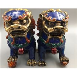 A Pair of Two Middle 20th Century Cloisonne Enamel Lions.