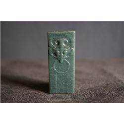 A Jade Pendant with "Ancient Beast" Pattern.