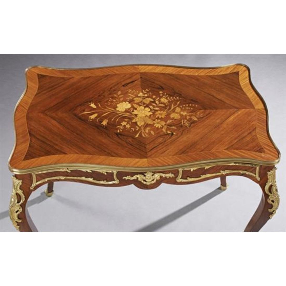 thc French Louis Xv Style Bronze Ormolu Mounted Marquetry Inlaid Kingwood Writing Table