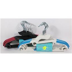 TWO BUNDLES OF NEW NO SLIP COAT HANGERS