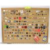 Image 1 : CORKBOARD WITH 180+ PINS INCL OLYMPICS, HOCKEY,
