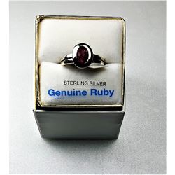 12)  STERLING SILVER & OVAL RUBY RING