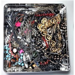 1)  LOT OF 24 NECKLACES IN TIN