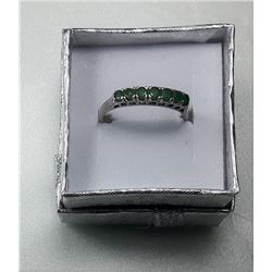 16)  STERLING SILVER & EMERALD RING