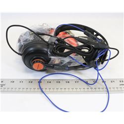 A PAIR OF UNUSED GAMING HEADSETS IN A BOX