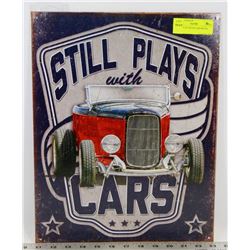 STILL PLAYS WITH CARS METAL SIGN