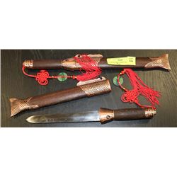 2 FISH THEMED SHORT SWORDS.