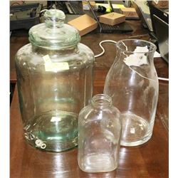 LOT OF 3 JARS/JUGS - ONE WITH LID, ONE 64OZ.