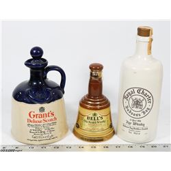 3 VINTAGE DECORATIVE STONEWARE LIQUOR DECANTERS