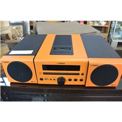 YAMAHA ORANGE BOOKSHELF STEREO AND SPEAKERS W/ IPOD DOCK