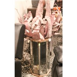 MIRROR AND CLEAR VASE WITH FLOWER