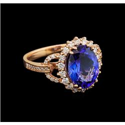 14KT Rose Gold 4.13 ctw Tanzanite and Diamond Ring