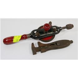 ANTIQUE DRILL AND CAST IRON WRENCH