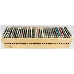 CD RACK FULL OF CDS