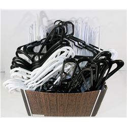 APPROX 75 PLASTIC HANGERS