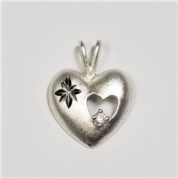 83) STERLING SILVER CUBIC ZIRCONIA PENDANT