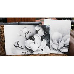 PAIR OF BLACK AND WHITE CANVAS FLOWER PICTURES