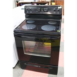 FRIGIDAIRE 4 BURNER FLAT TOP BLACK STOVE.
