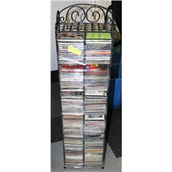 CD RACK WITH OVER 100 CDS