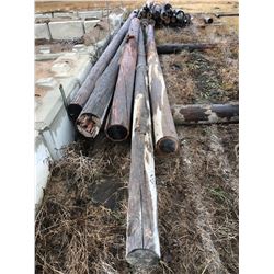 7 wooden power poles various sizes