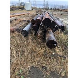 12 wooden power poles various sizes