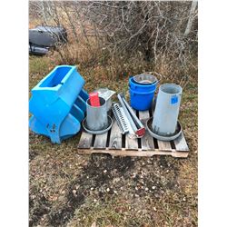 Pallet of buckets and chicken feeders