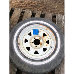 1 Pirelli tire with rim size P205/75R15, bucket of misc chains