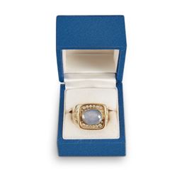 A Gent's 18k Gold, Diamond & Star Sapphire Ring