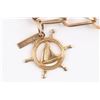 Image 2 : A 10K Gold Charm Bracelet