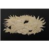 Image 1 : A Natural Material Carved Decoration in a "Dragon" Pattern.