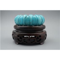 A Turquoise Bracelet.