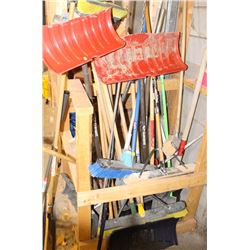 LOT OF ASSORTED BROOMS AND SHOVELS
