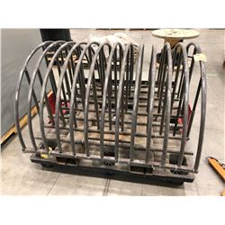 Transport device for oversized material, made from steel tubing strapped to pallet