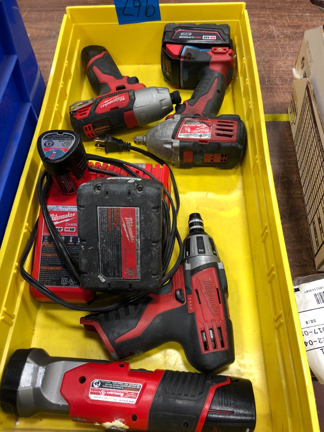 Milwaukee M18 drill, M18 impact, M12 driver, M12 impact M12 flashlight, 2 extra M12 battery & chargi