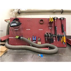 Tool board includes face shield, pliers, knives, hammers, squares, punches and deburring tools