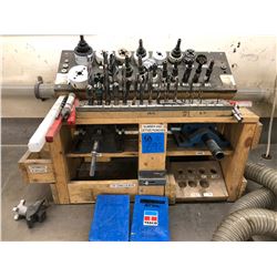 Wooden shelf c/w 2 vises, drill bits, hole saws, drill bit index
