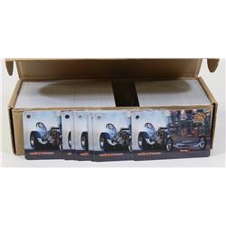 BOX OF ASSORTED RACE CAR COLLECTOR CAR TAGGZ