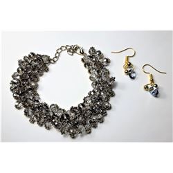 25)  GOLD TONE & GREY SWAROVSKI CRYSTAL