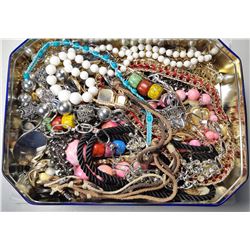 5)  TIN FULL OF JEWELRY