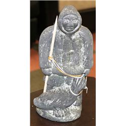 THE WOLF SCULPTURE OF  INUIT HUNTER