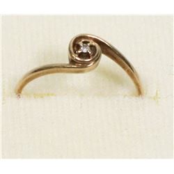 LADIES SIZE 6.25,  STAMPED 10K GOLD, WITH CLEAR