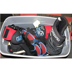 LARGE TUB OF HOCKEY EQUIPMENT