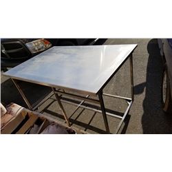 5 FOOT BY 41 INCH BY 3 FOOT TALL STAINLESS WORK TABLE