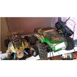 2 HOBBY GRADE ELECTRIC RC CARS W/ ONE CONTROLLER